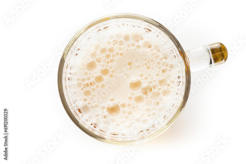 top view of mug with beer isolated on white background