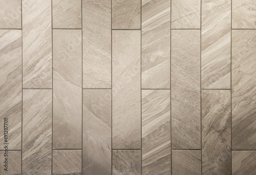 Beige shower wall tiles with grout