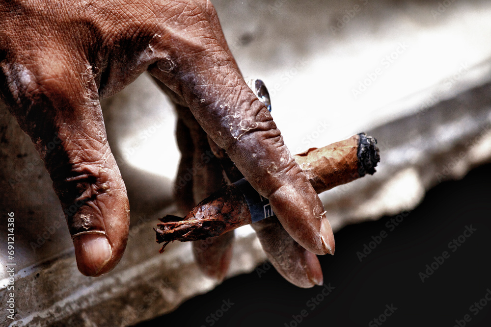 Fototapeta premium Mano tabaco