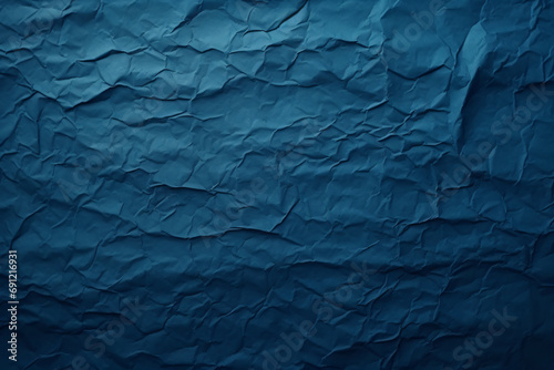 Blue scrunched paper texture background photo