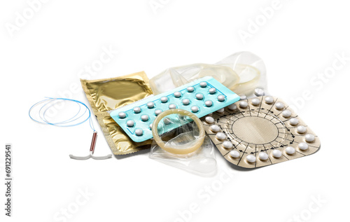 Contraceptive pills, condoms and intrauterine device isolated on white. Different birth control methods