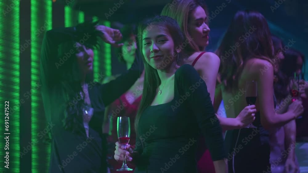 Slow motion VDO. Happy fun Asian thai people dance in night club. Group of Sexy young woman and friends dancing in night club. Nightlife and disco dance party concept. Fun music festival Slow motion VDO. Happy fun Asian thai people dance in night club. Group of Sexy young woman and friends dancing in night club. Nightlife and disco dance party concept. Fun music festival