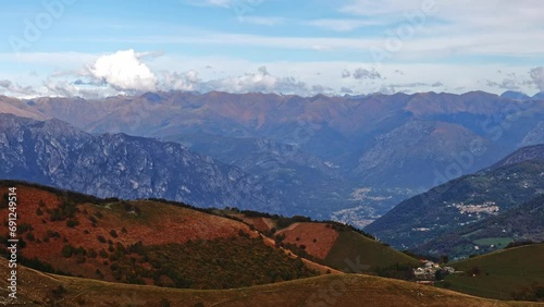 Panoramic View over Muggio Valley with Mountainscape and Sky with Clouds in a Sunny Day in Muggio, Ticino, Switzerland, Europe photo