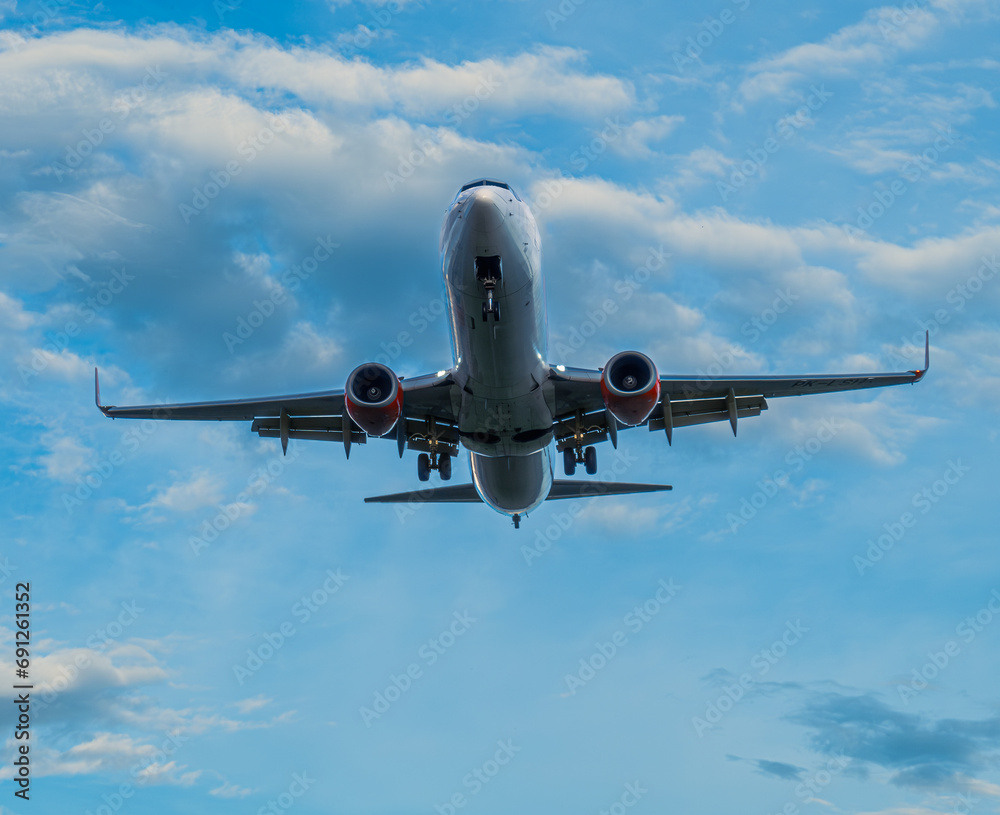 a Commercial Jet plane prepare to landing at the airport. a Commercial Jet plane prepare to landing at the airport.