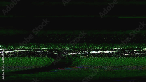 Glitch noise. Screen distortion. VHS defect. Green white color grain artifacts texture on dark black abstract empty space illustration background.