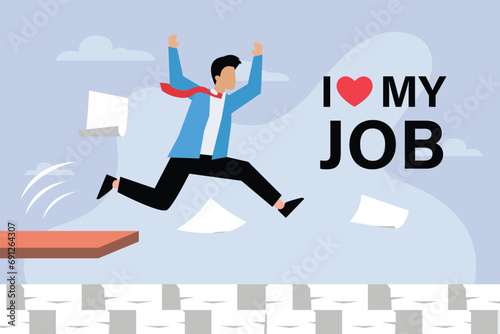 Happy businessman loving his job jumping to stack of papers