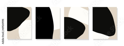 Mid century modern wall decor with abstract black and white shapes on a beige background.