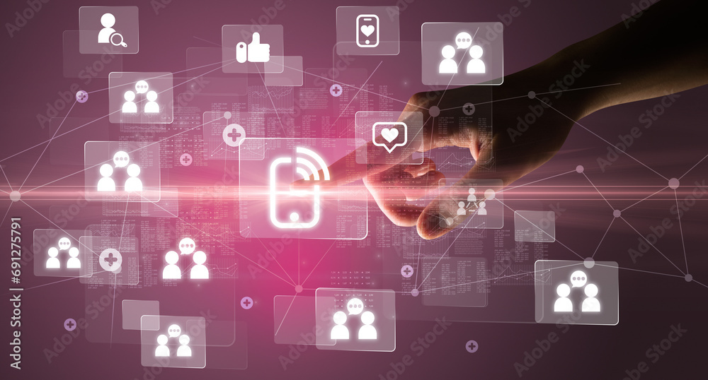 Hand pressing social media multimedia application screen with media icons on futuristic concept Hand pressing social media multimedia application screen with media icons on futuristic concept