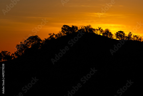 Sunset at Undara Volcanic National Park, Queensland, Australia. Looking out to the mountains and the horizon. photo