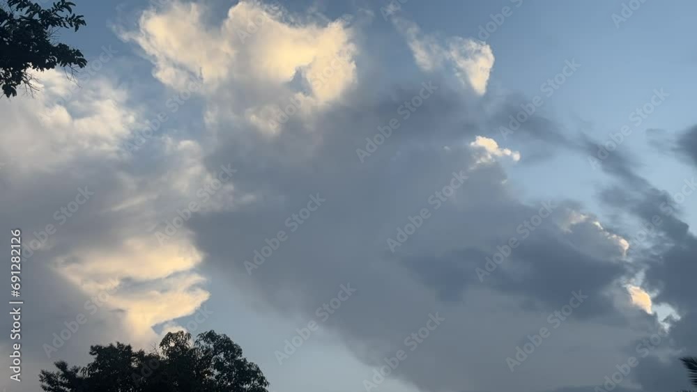 Movement of white clouds and grey clouds. Time Lapse Movement of white clouds and grey clouds. Time Lapse
