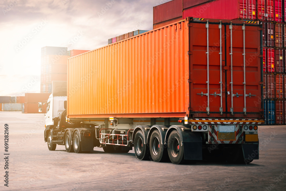 Semi trailer Truck on The Parking Lot. Stacked of Containers Cargo