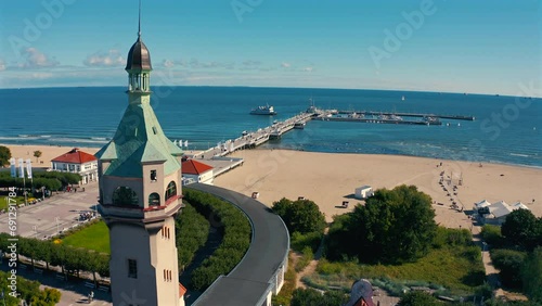 Aerial view of city center in Sopot, drone flying towards the pier at sunny summer day photo