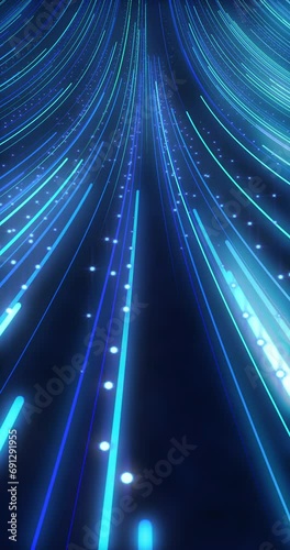 Abstract Blue particle light trails on dark background. Line shape light trails. repeatable footage. Vertical video.