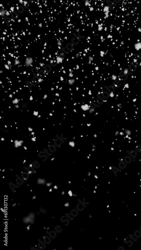 Vertical Snowfall on the blackscreen 4k