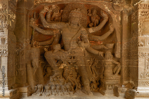 Shiva Gajasamharamurti, slaying the Elephant Demon, Kailasha temple, Ellora, Maharashtra, India, Asia. photo