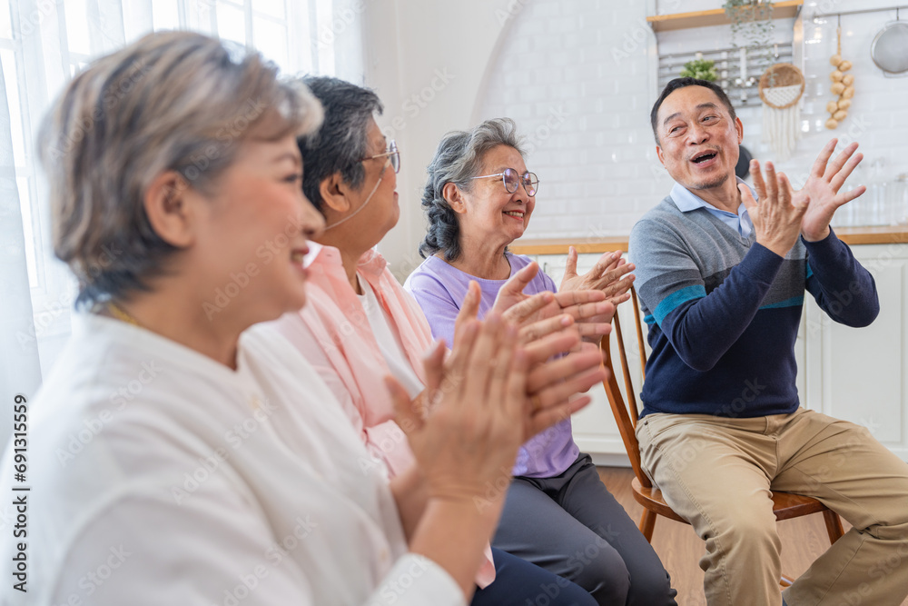 senior females and male sitting on bench. older people are listening and enjoy meeting focus group at living room. Joyful carefree retired senior friends enjoying relaxation at nearly home. senior females and male sitting on bench. older people are listening and enjoy meeting focus group at living room. Joyful carefree retired senior friends enjoying relaxation at nearly home.
