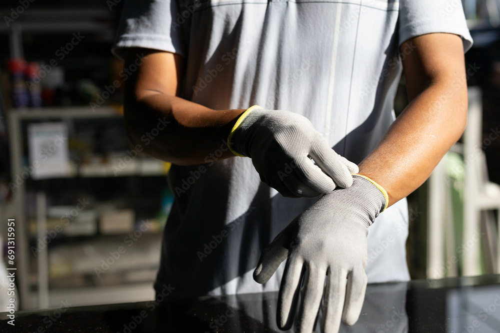 Obraz premium Gloves for cutting glass and sharp objects, rubber gloves, white gloves