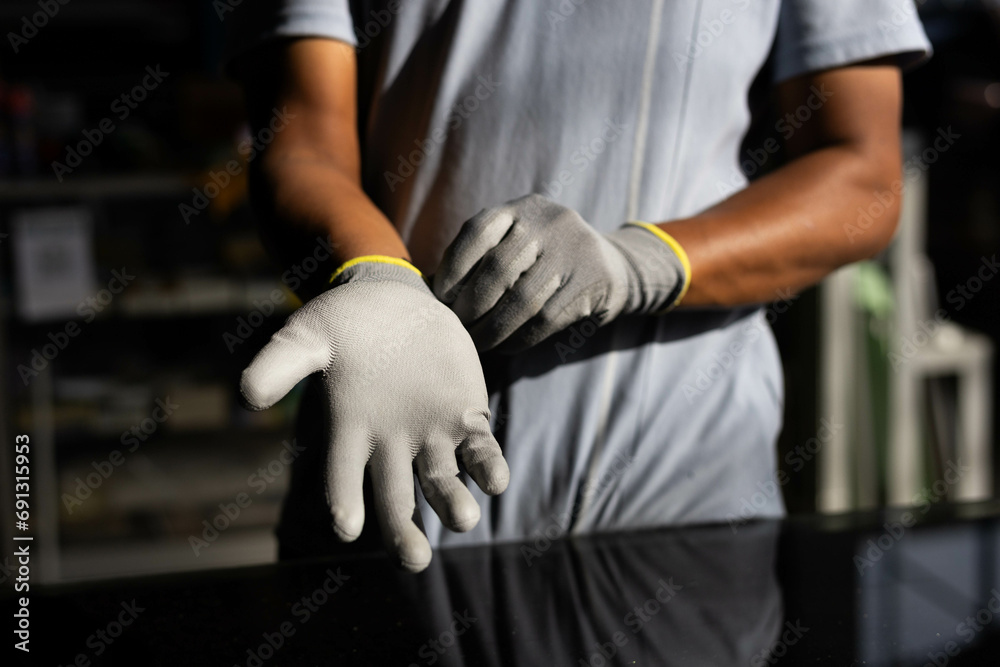 Fototapeta premium Gloves for cutting glass and sharp objects, rubber gloves, white gloves