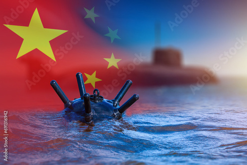 Sea mine in water. Flag China. Submarine near naval bomb. Mine for protecting marine state borders. Bomb during war in China. Chinese navy naval exercise concept. Mine risks sinking ship. Art focus photo