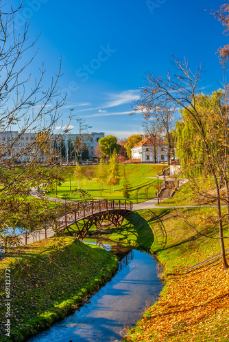 Picturesque Cityscape of Old city Grodno In Autumn Morning With Old Houses and River Embankment In background At Sunny Sky.