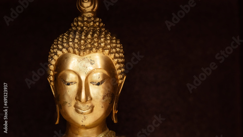 Buddha's face on blur background, Believe in Buddhism, Buddha statue used as amulets of Buddhism religion