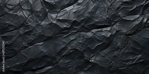 Rock texture with cracks. Black stone background with copy space for design. Wide banner.