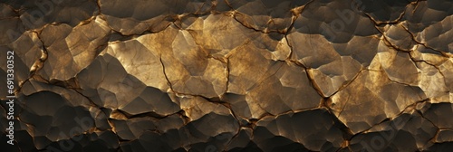 Rock texture with cracks. Golden stone background with copy space for design. Wide banner. photo