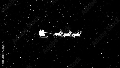 Mystical Midnight Ride: Santa and Sleigh Soaring Through Snowy Night photo
