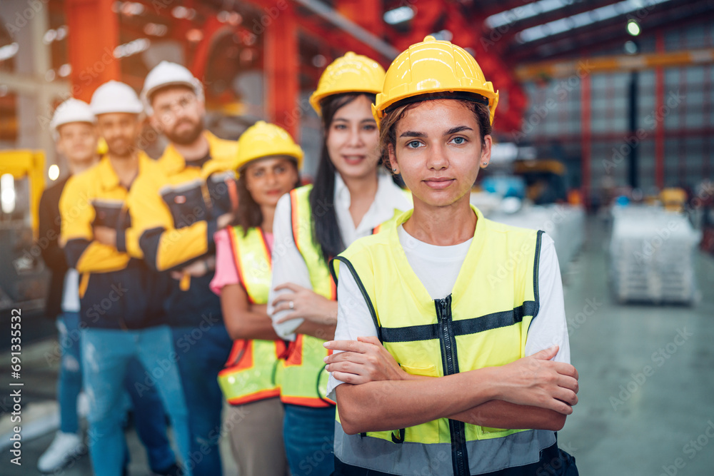 Team and portrait of engineering employees standing in an industrial manufacturing factory. , Working together, Coordination and Teamwork concept. Team and portrait of engineering employees standing in an industrial manufacturing factory. , Working together, Coordination and Teamwork concept.