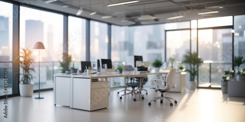 The light-filled modern office interior with panoramic windows and exquisite lighting showcases a stunningly blurred background.