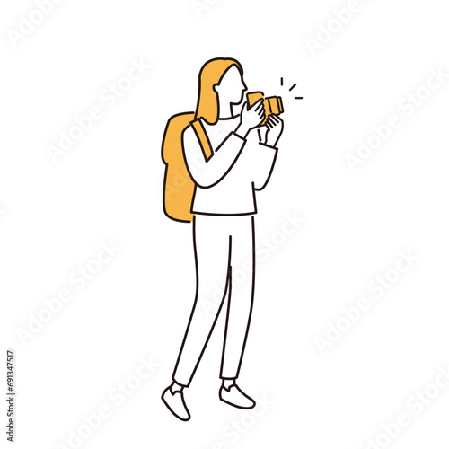 写真撮影をする女性	