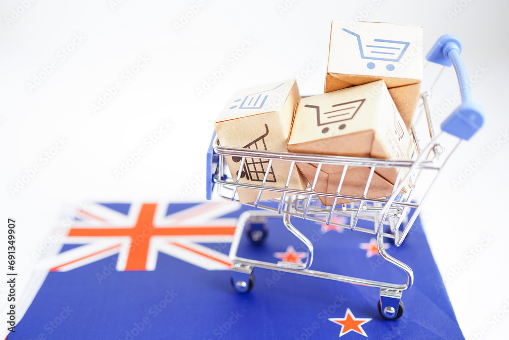 Online shopping, Shopping cart box on New Zealand flag, import export, finance commerce.
