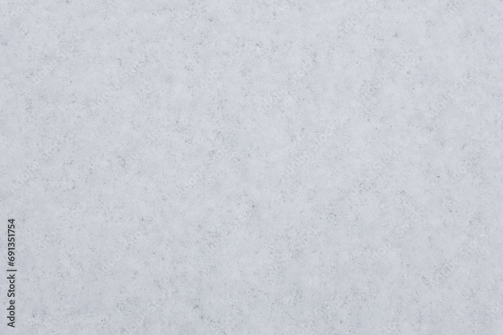 Winter snow. Snow texture Top view of snow. Texture for design. Snowy white texture. Snowflakes.