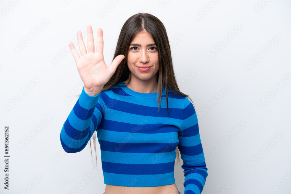 Young caucasian woman isolated on white background counting five with fingers Young caucasian woman isolated on white background counting five with fingers