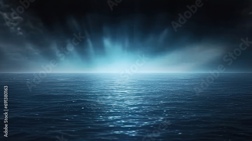 A dark blue background with light shining through the water. Perfect for underwater-themed designs, maritime or aquatic promotions, or peaceful and calming visual content. Ideal for web banners, poste © Planetz