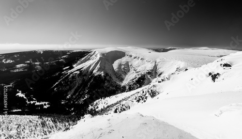 Nice panorama of winter mountain landscape from the mountain ridge © Martin