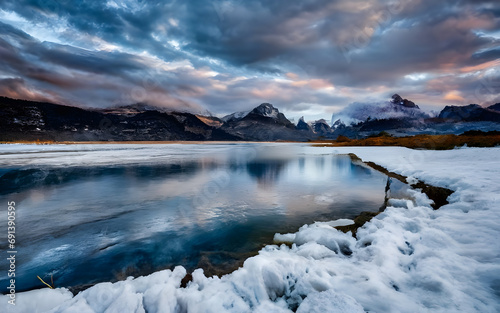 Majestic Winter Symphony, A Frozen Lake Braces for the Approaching Storm