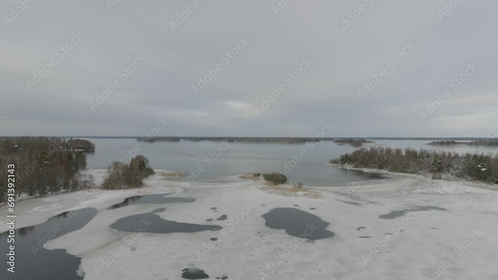 Amazing winter landscape over a frozen lake Amazing winter landscape over a frozen lake