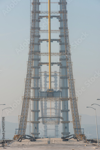 Osman Gazi Bridge (Izmit Bay Bridge). Izmit, Kocaeli, Turkey. Construction of a new road bridge continues across the Marmara Sea. photo