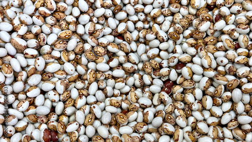 direct top view group of raw Japanese hidatsa shield beans ready to cook under natural light photo