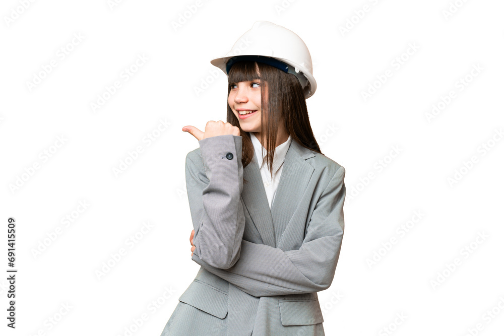 Little girl playing as a architect with helmet and holding blueprints over isolated background pointing to the side to present a product Little girl playing as a architect with helmet and holding blueprints over isolated background pointing to the side to present a product