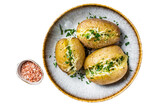 Baked Jacket potatoes with cheese and butter. Transparent background. Isolated.