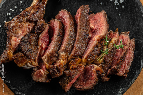 Medium Ribeye sliced steak. Food recipe background. Close up