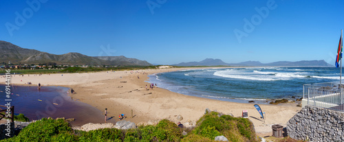 The beautiful Kleinmond Lagoon and Estuary at the Blue Flag Kleinmond beach with views of the Palmiet Mountains. Overberg. Western Cape, South Africa photo