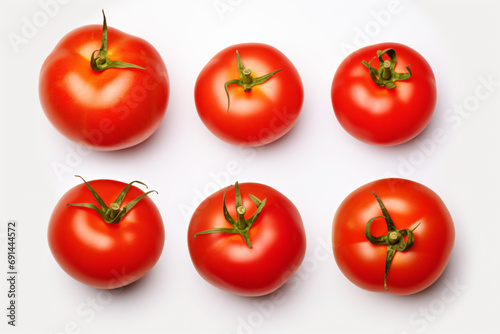 six tomatoes are arranged in a row on a white surface