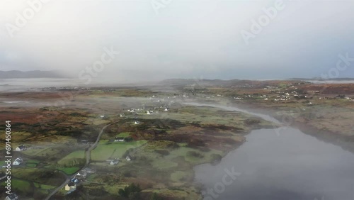 Aerial view of Lough Fad by Portnoo in the fog, County Donegal, Ireland photo