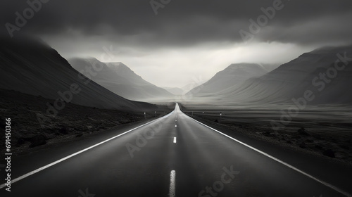 black and white long road without car
