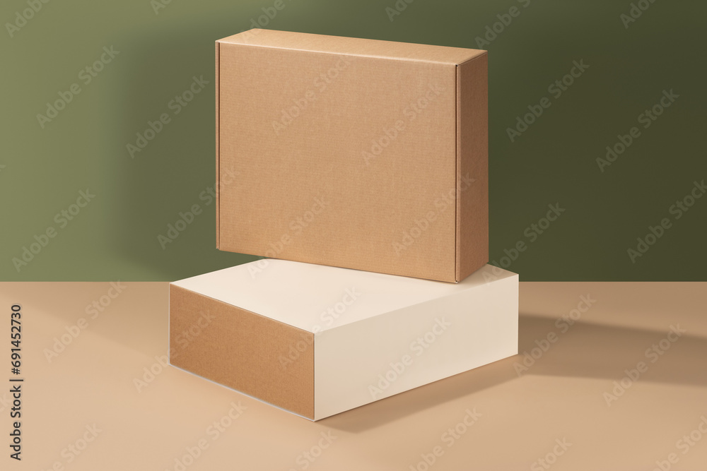 Mockup of a packaging box made of kraft brown cardboard without a logo Mockup of a packaging box made of kraft brown cardboard without a logo