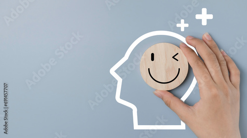 Happy smile relax face in wooden lable and positive thinking . Emotion happiness feed good  concept. Customer review assessment quality or feedback good mood, Happy mental. photo
