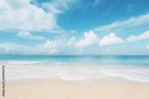 Bumpy tropical sandy beach with blurry blue ocean and sky © FawziaEssa